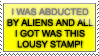 a stamp picturing the phrase i was abducted by aliens and all i got was this lousy stamp.